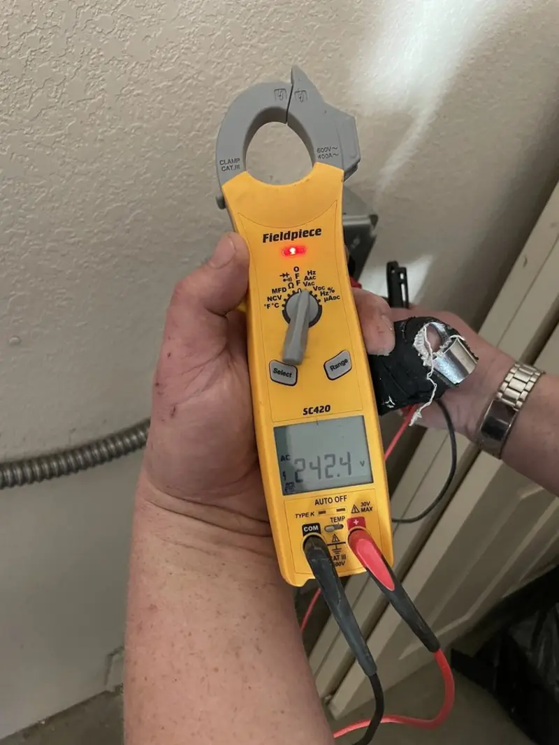 Voltage testing with clamp meter during Generator Installation in Eastland
